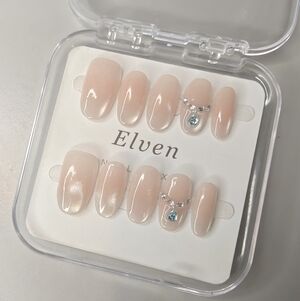 Elegant Nude Handmade Press-On Nails with Gem Accents Short Round Shape